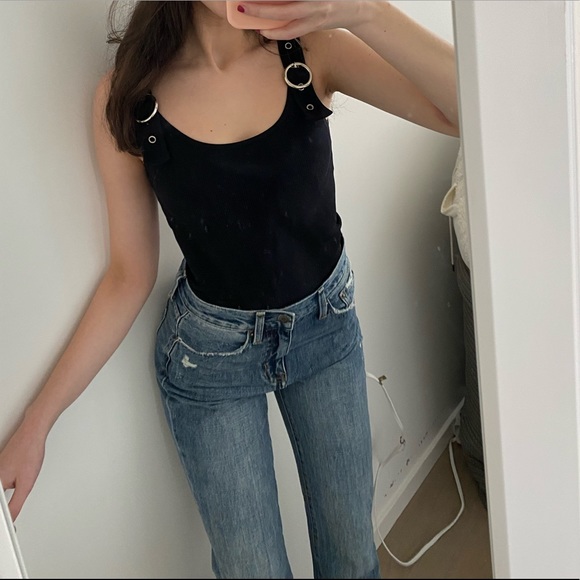 Black tank with buckles on the straps. Super cute and trendy. One size fits all - Picture 1 of 2